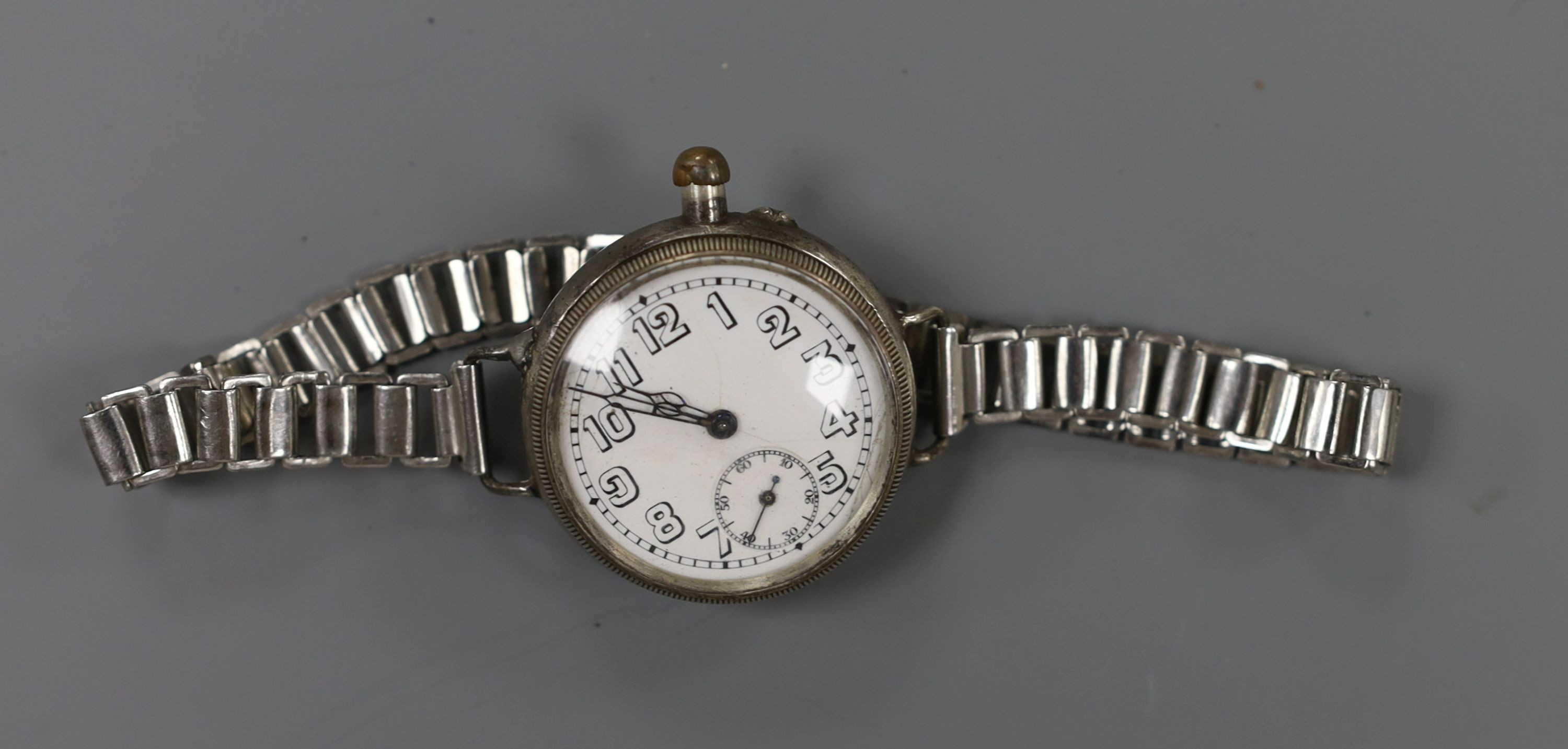 A gentleman's early 20th century silver Borgel cased manual wind wrist watch, on a metal bracelet.